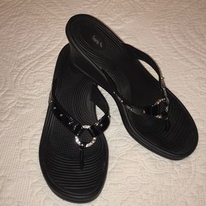 Skechers wedge thong sandal.